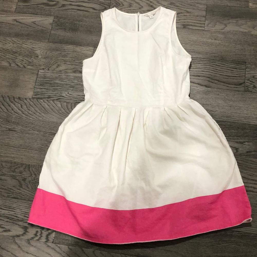 Sleeveless white linen dress